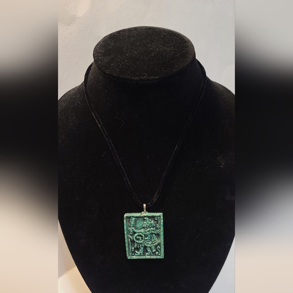 Jaguar Aztec Green Amulet pendant holding a Macahuitl Aztec Club